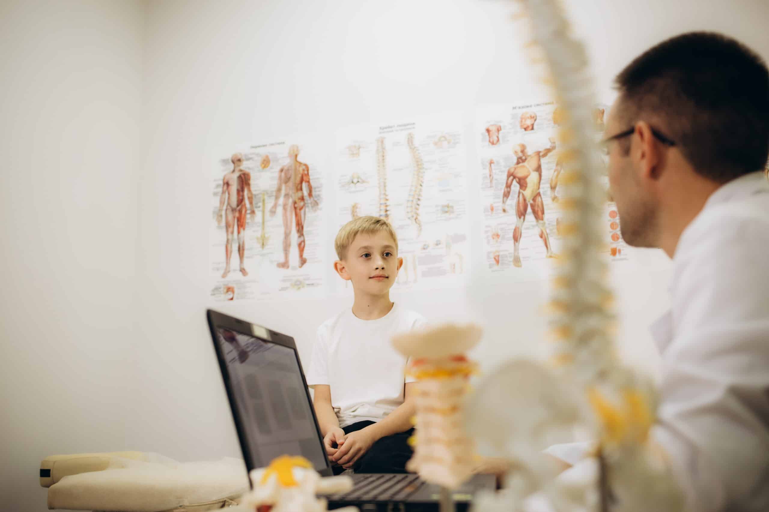 the husband's osteopath examines the child